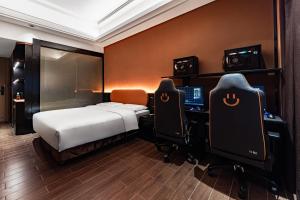 Cama o camas de una habitación en Super Time Monster Esports Hotel Shenzhen Nanshan Subway Station Branch