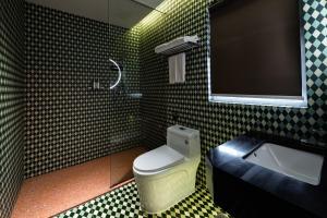 Un baño de Super Time Monster Esports Hotel Shenzhen Nanshan Subway Station Branch