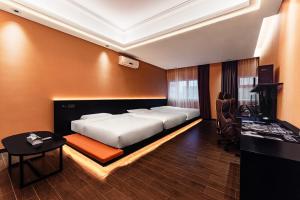 Cama o camas de una habitación en Super Time Monster Esports Hotel Shenzhen Nanshan Subway Station Branch