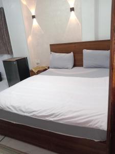 Letto o letti in una camera di Pyramids Home Guest House