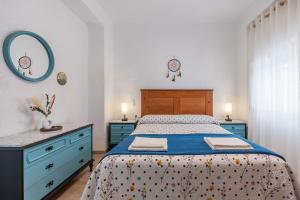 Ένα ή περισσότερα κρεβάτια σε δωμάτιο στο Casa las Golondrinas Orgiva