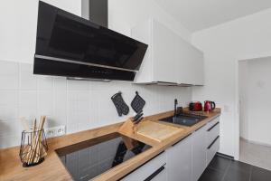 Kuchyň nebo kuchyňský kout v ubytování MARLEI 6 Apartment mit 3 Schlafzimmern, gemütlichen Wohnbereich, mit 2 WCs
