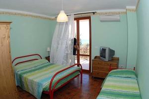 Postel nebo postele na pokoji v ubytování Agriturismo Nardini