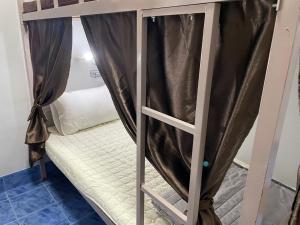 Postel nebo postele na pokoji v ubytování Zou Hostel