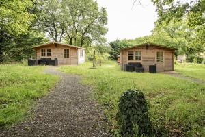 Κήπος έξω από το Chalet L'Evasion Rochetrejoux proche Puy Du Fou +15 φωτογραφίες