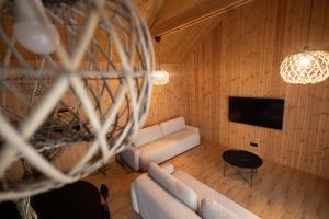 Televizorius ir (arba) pramogų centras apgyvendinimo įstaigoje Viesuli Village Villas