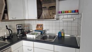 Kuchyň nebo kuchyňský kout v ubytování Gemütliches Apartment in Bad Berneck