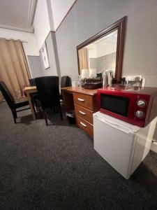 Η κουζίνα ή μικρή κουζίνα στο piccolo Hotel