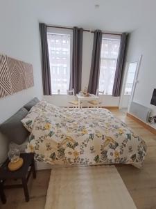 Postel nebo postele na pokoji v ubytování Chez Catherine