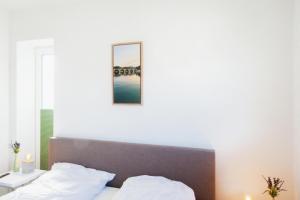 Postel nebo postele na pokoji v ubytování Ferienhaus Diemelblick 26