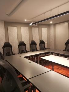 a conference room with tables and chairs in it at TAJ Hotel in Islamabad +33 photos
