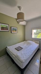 Ένα ή περισσότερα κρεβάτια σε δωμάτιο στο Masqueyras +26 φωτογραφίες