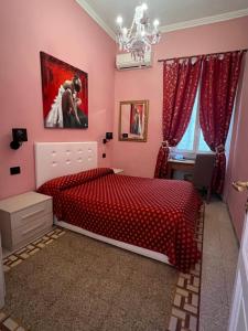A bed or beds in a room at Guest House Biondi