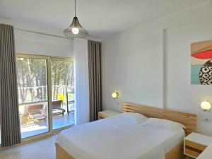 Ένα ή περισσότερα κρεβάτια σε δωμάτιο στο Serenity Penthouse - 260