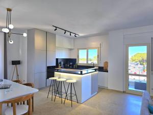 Η κουζίνα ή μικρή κουζίνα στο Serenity Penthouse - 260