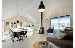 Posezení v ubytování Gorgeous Home In Grenaa With Sauna