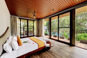 Sandesh Water Edge Kabini客房内的一张或多张床位