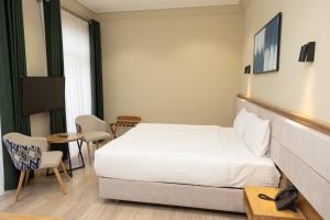 Кровать или кровати в номере Hotel Marwa Tashkent Pool&Spa