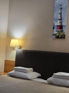 Postel nebo postele na pokoji v ubytování Hotel Yes