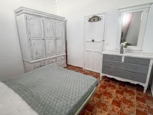Ένα ή περισσότερα κρεβάτια σε δωμάτιο στο Casa Gattone Adeje Los Menores