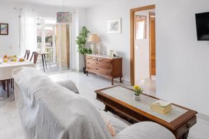 Et tv og/eller underholdning på Mar de la Abadía Rooms Shared Apartment