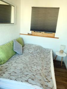 Ein Bett oder Betten in einem Zimmer der Unterkunft Dünenhof DB3-040 Dünenhof
