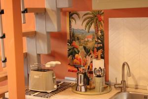 Kuchyň nebo kuchyňský kout v ubytování Mediterraneo Loft - Fabrique - Milano Santa Giulia Hockey Arena - 20 minutes from Duomo