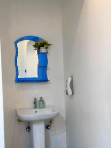 Baðherbergi á Cassa Villa