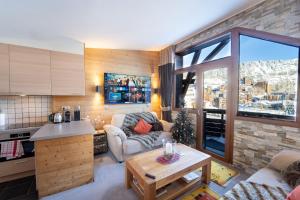 Posezení v ubytování Chalet Neva - luxury chalet with sauna by Avoriaz Chalets