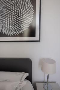 Ένα ή περισσότερα κρεβάτια σε δωμάτιο στο The View Penthouse