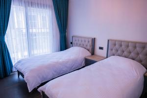 Postel nebo postele na pokoji v ubytování Süper villa havuzlu + 24 fotografií