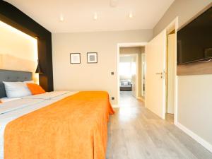 Ein Bett oder Betten in einem Zimmer der Unterkunft JustStay Ratingen Hotel & Apartments