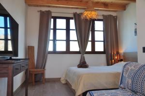 Posteľ alebo postele v izbe v ubytovaní Tindaya Nature Home Ocean View