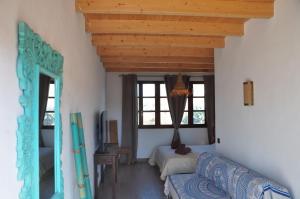 Posteľ alebo postele v izbe v ubytovaní Tindaya Nature Home Ocean View