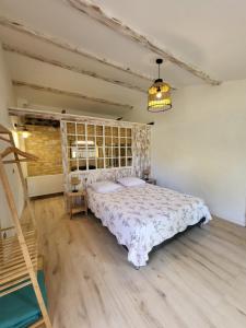 Postel nebo postele na pokoji v ubytování 1 Chambre piscine commune et 1 Gite piscine privée La Sauvasse