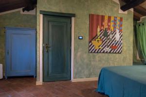 Postel nebo postele na pokoji v ubytování B&B il Fornello a Padernello