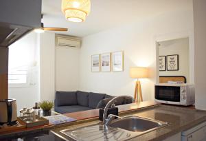 Kuchyňa alebo kuchynka v ubytovaní Precioso apartamento en el centro de Málaga