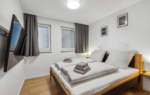 Postel nebo postele na pokoji v ubytování Gebirgsresort Winterberg + 11 fotografií