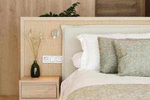 Postel nebo postele na pokoji v ubytování Iberostar Selection Es Trenc -New Opening-