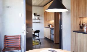 Kuchyň nebo kuchyňský kout v ubytování Hotel GUESTapart