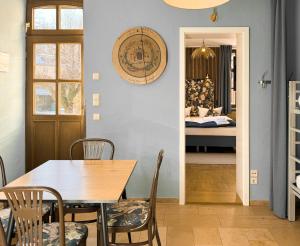a dining room with a table and chairs at Villa Fantasia Budget Boutique Hotel in Füssen