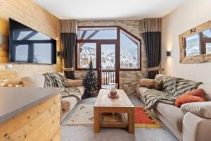 Posezení v ubytování Chalet Neva - luxury chalet with sauna by Avoriaz Chalets