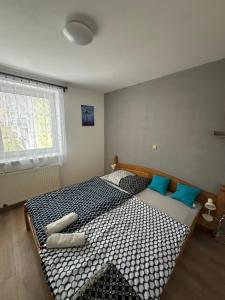 Posteľ alebo postele v izbe v ubytovaní Ubytování Niagara