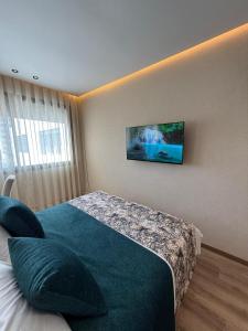 TV o dispositivi per l'intrattenimento presso Beautiful new studio with a Seaview 8