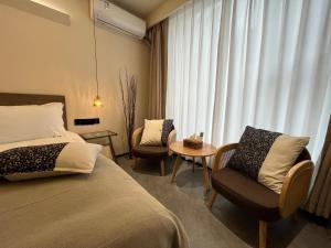 Легло или легла в стая в Yish Cinema Serviced Apartment B&B