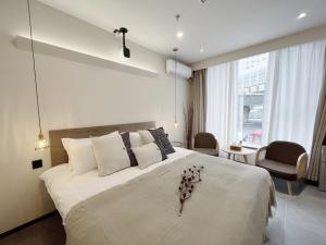 Легло или легла в стая в Yish Cinema Serviced Apartment B&B