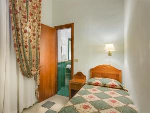 Postel nebo postele na pokoji v ubytování Hotel Aberdeen