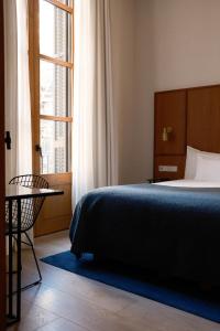 Postel nebo postele na pokoji v ubytování Yurbban Passage Hotel & Spa