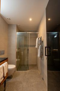 Kúpeľňa v ubytovaní Hotel Tonanti