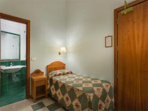Postel nebo postele na pokoji v ubytování Hotel Aberdeen